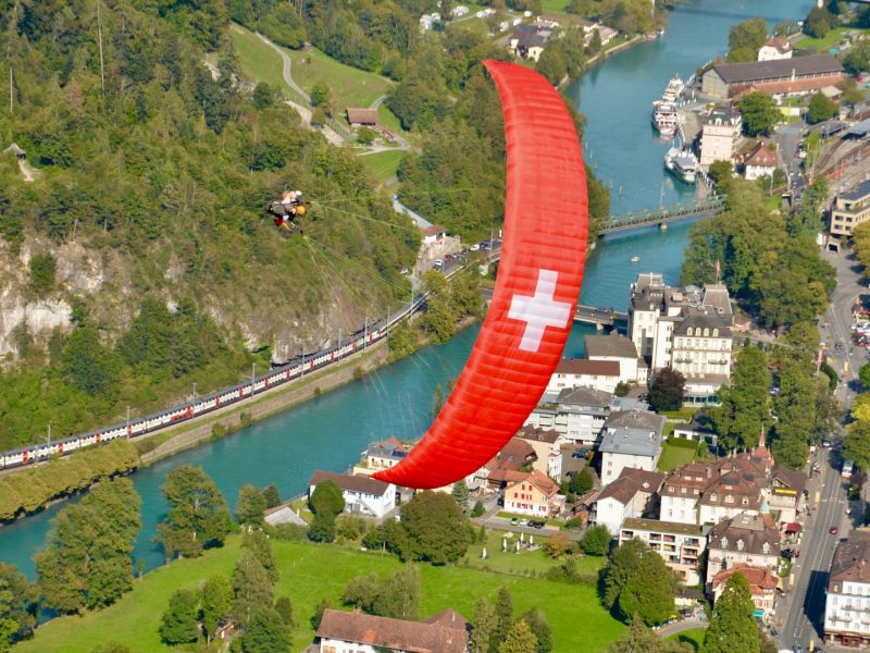 Paragliding_Interlaken_Tours_wing_over_town
